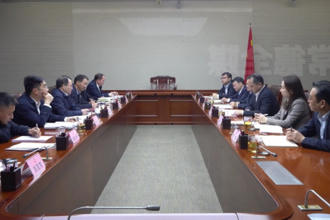 周振宇会见省农信联社黄向阳一行