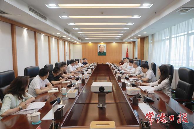 罗毅君与五洲世纪集团董事长徐登权举行工作会谈