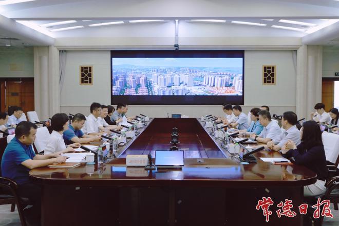 罗毅君与国科控股总经理陈静一行举行工作会谈